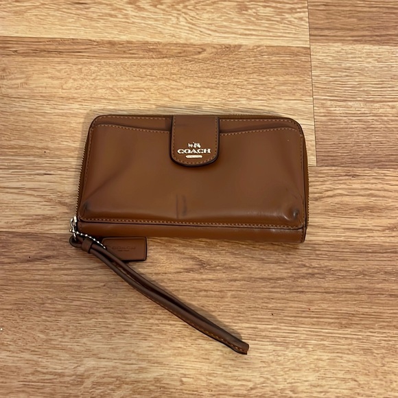 Coach Handbags - Coach wristlet- cognac color